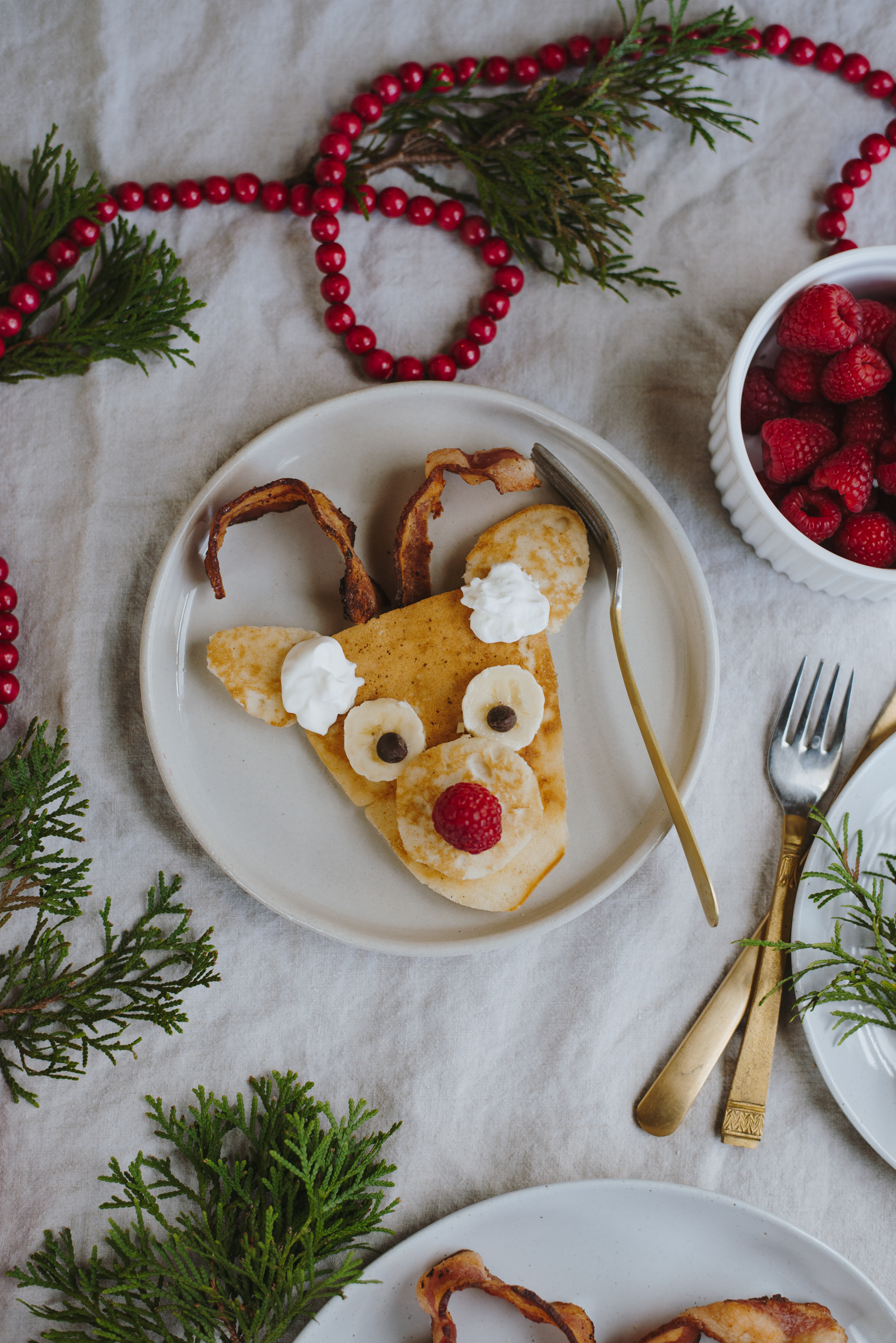 reindeer pancakes on linen tablecloth